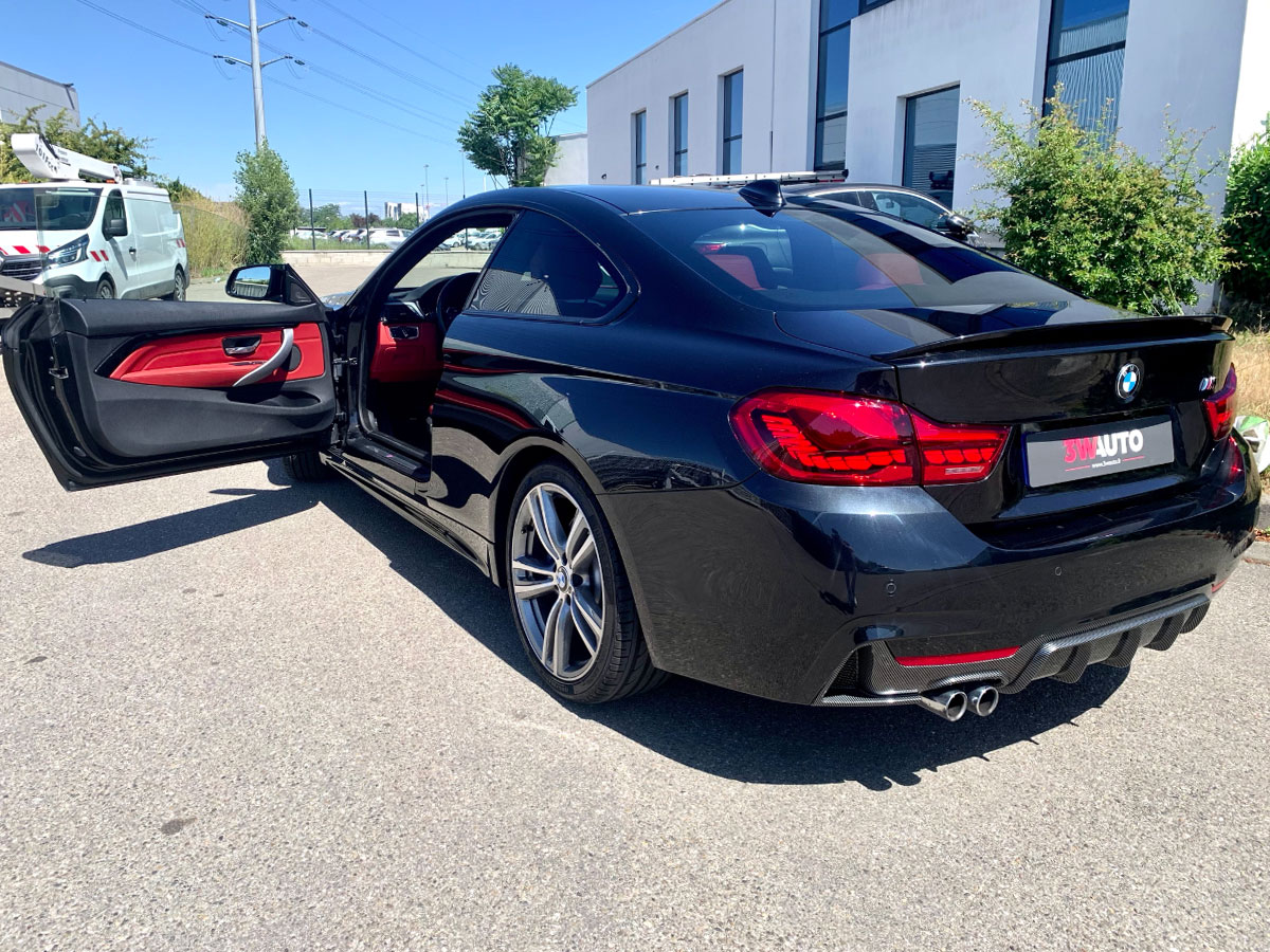 BMW 428i noir avec intérieur cuir rouge