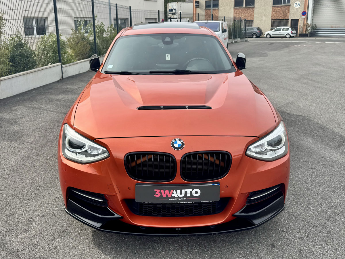BMW M135i F20 Orange Valencia avec capot M2 CS et pack M performance
